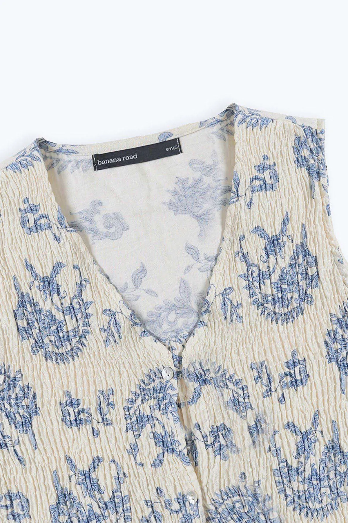 BLUE SMOCKED VEST
