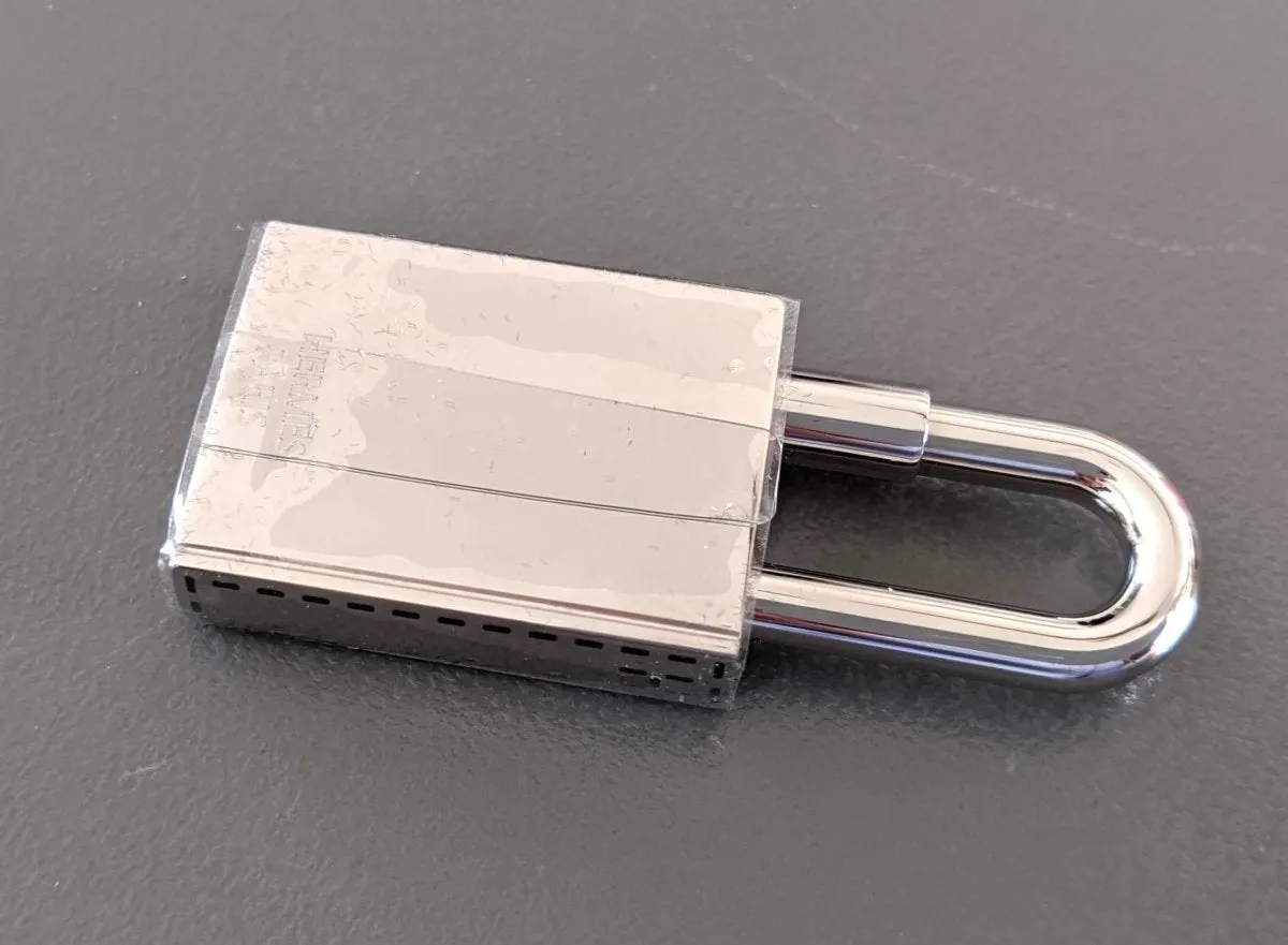 Hermes Silvered CONTE ET RACONTE Cadenas Lock Charm Brand New in Sealed Box!