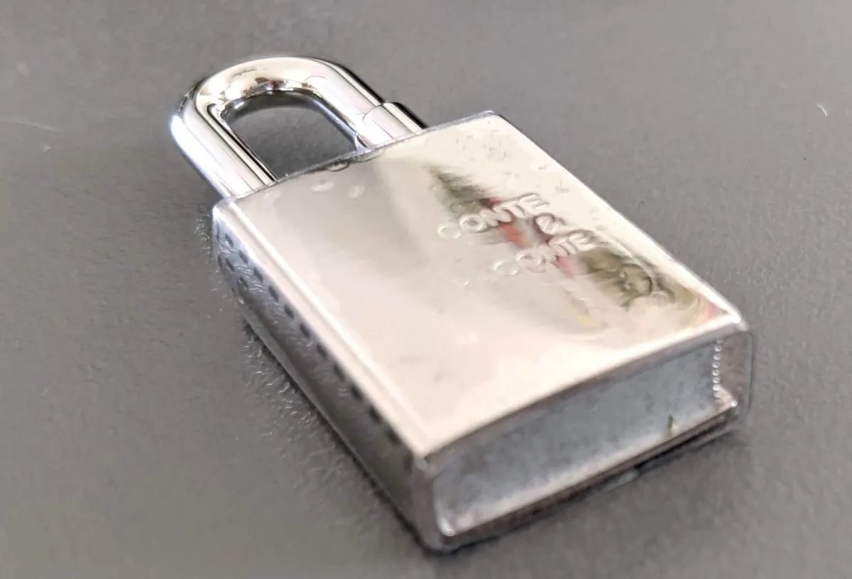Hermes Silvered CONTE ET RACONTE Cadenas Lock Charm Brand New in Sealed Box!