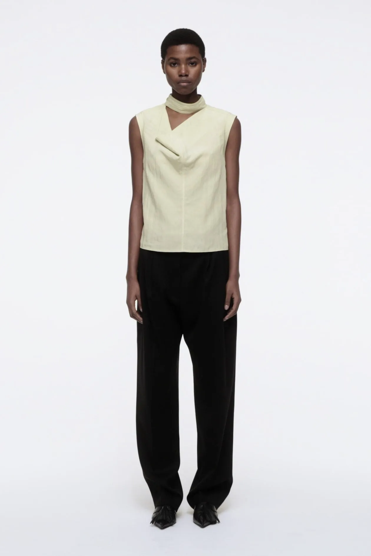 Sleeveless cut-out cowl-neck blouse